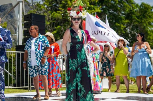 Learn About Capitec Franschhoek Cap Classique depicted by guests and woman with garland